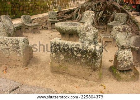 SAMOSIR, INDONESIA - MARCH 6: Ancient stone chairs on March 6, 2012  on Samosir island, Indonesia. Samosir is the largest island within an island and the fifth largest lake island in the world.