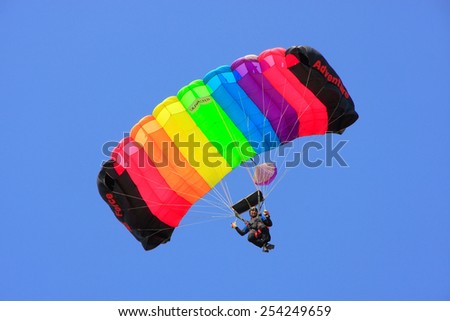 JAISALMER, INDIA - FEBRUARY 16: Unidentified air force soldier skydives during Desert Festival on February 16, 2011 in Jaisalmer, India. Purpose of Festival is to display colorful culture of Rajasthan