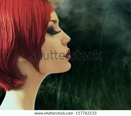 Profile of beautiful girl with short red hair