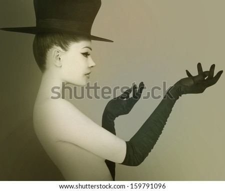 Elegant lady with hat and gloves.