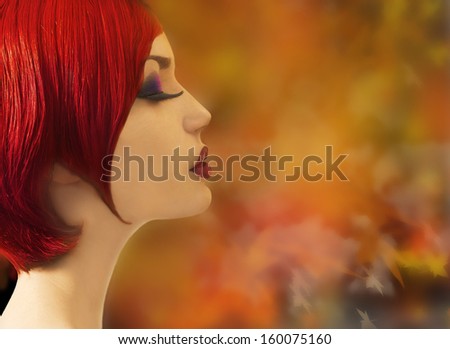 profile of beautiful girl with short red hair