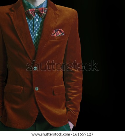 Stylish young man in hipster suit
