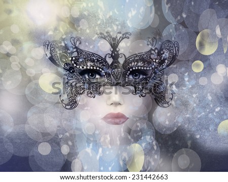 Art photo of Beautiful woman in mysterious mask.