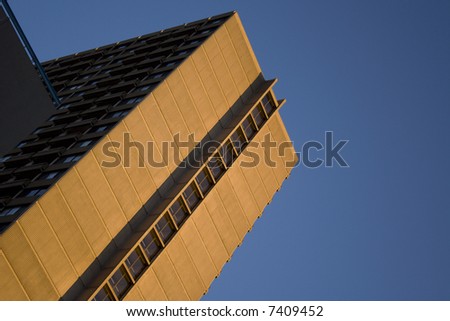 Apartment building on bright evening sun with copy-space