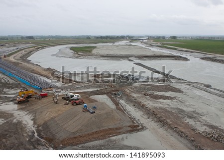 ABBEY SAINT-MICHEL, FRANCE - MAY 15: Construction of a new road to San Michel castle to replacing the old dam water eroding, May 15, 2013, Mont Saint-Michel, France.
