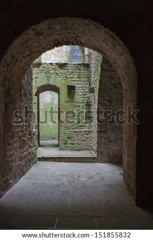 medieval yard entrance with arch