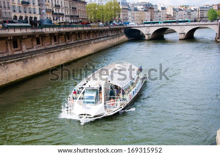 Paris, France - April 12, 2011 : Boat tour of Paris and the river Seine 