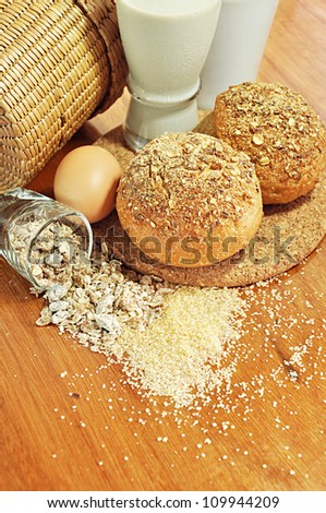 Foods for breakfast - multigrain bread, milk, egg and cereal - still life food concept