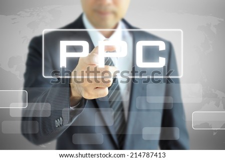 Businessman pointing to PPC (or Pay Per Click) on virtual screen