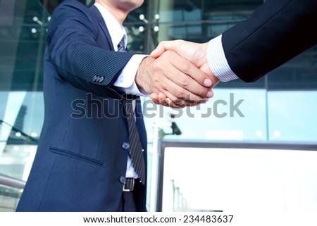 Handshake of businessmen success congratulation greeting & business partner concepts Handshake of businessmen success congratulation greeting & business partner concepts
