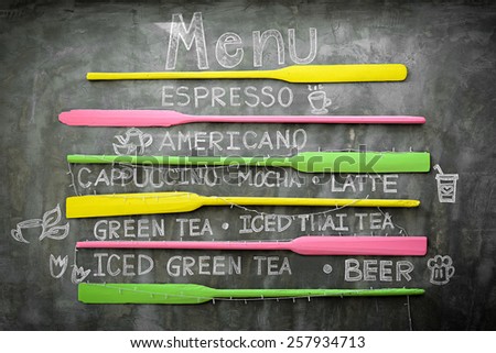 Chalk written drink menu on concrete wall, retro colorful creative style