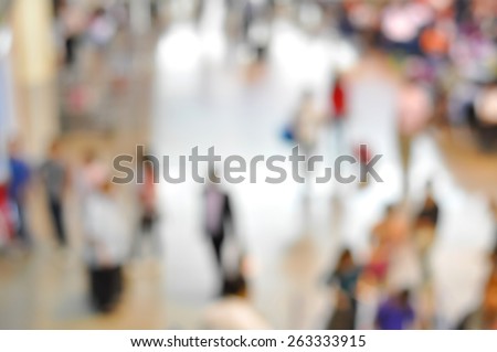 Blurred people at the airport hallway, can be used as background