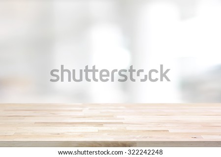 Wood table top on white blurred abstract background from building hallway  - can be used for display or montage your products