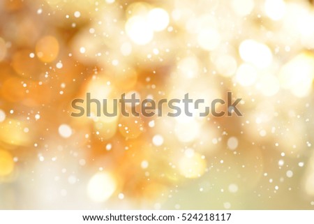 Abstract gold bokeh with snow, Christmas and new year theme background