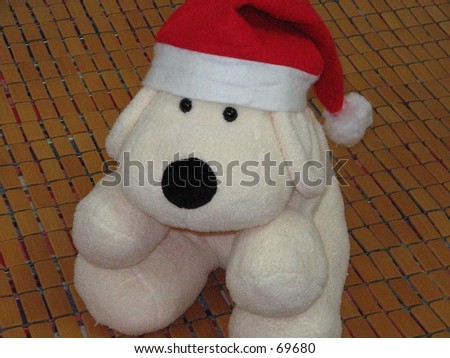 floppy dogs sitting in santa hat