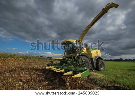Germany - Schleswig Holstein - October 10, 2014: corn harvester in the Corn crop