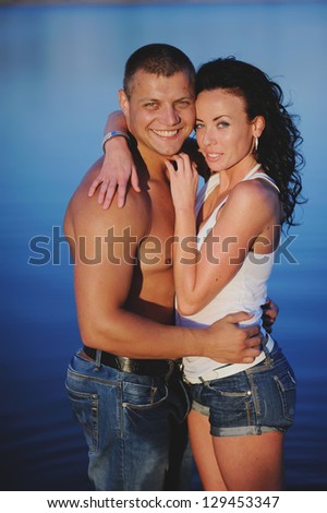 Heterosexual Couple in the sea, posing