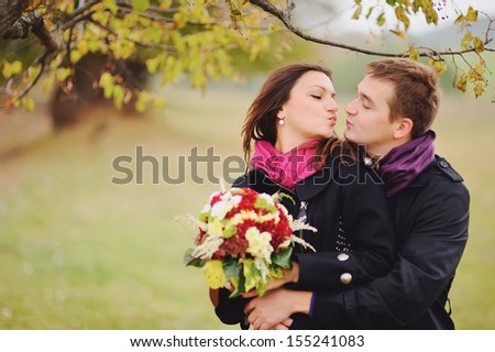 kiss me baby, and never let me go, young couple in love having date