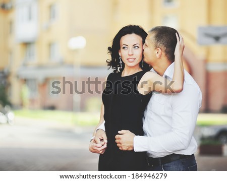 Young couple having date downtown. Boyfriend and girlfriend together.