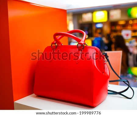 Red fashion bag in store