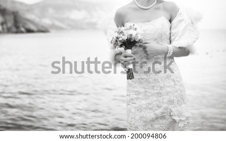 Black and white wedding picture. Young bride.
