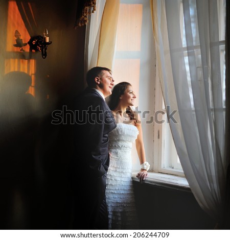 Loving newlywed couple outdoor. Bride and Groom at wedding Day.
