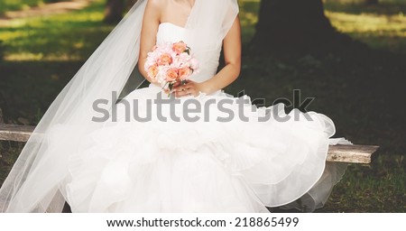 Beautiful bride enjoying happy wedding day.