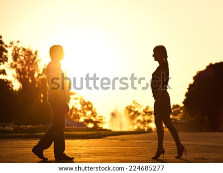 Summer of our love. Young couple having date on sunset background.
