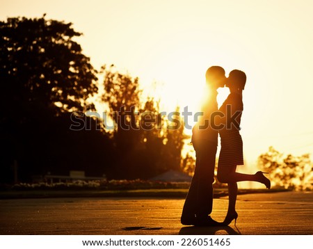 Dating on sunset background, summer of our love.