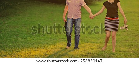 Summer of our love. Young happy couple together in park.