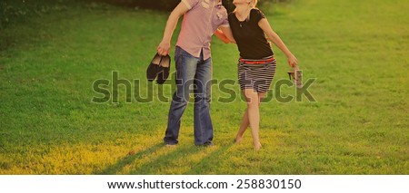 Summer of our love. Young happy couple together in park.