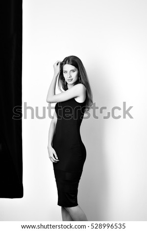 Fashion Studio Portrait of a woman in front of strip box
