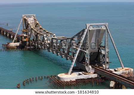 Pamban Bridge.India\'s first sea bridge across sea.Its a cantilever bridge.It opens up at center to make way for ships.