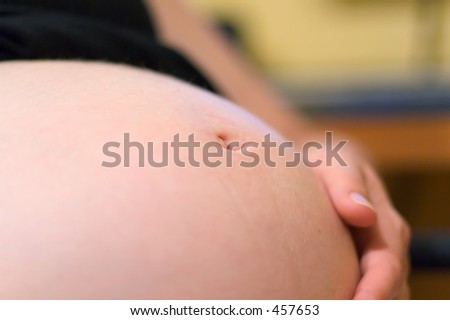 stock photo : Pregnant belly pregnant belly button. stock photo : Pregnant belly