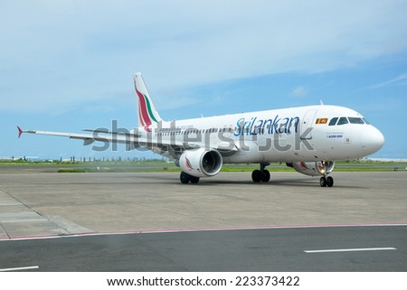 MALE, MALDIVES - SEPTEMBER 4, 2014: A SriLankan Airlines Airbus A320 at Ibrahim Nasir International Airport. SriLankan Airlines is the flag carrier of Sri Lanka.