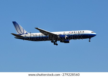 STERLING, USA - NOVEMBER 8, 2011: United Airlines Boeing 767 landing at Washington Dulles International Airport. United Airlines is a major US airline headquartered in Chicago, USA.