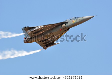BENGALURU, INDIA - FEBRUARY 22, 2015: HAL Tejas of Indian Air Force on display at Aero India 2015. Aero India is a biennial air show and aviation exhibition.