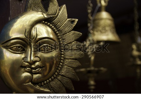 Medallion of Sun and Moon! A handicraft made of Bronze, by Indian artists showing celestial Sun and Moon,with bells & lamps in the rear.