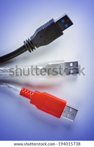 Computer USB Cables against blue background