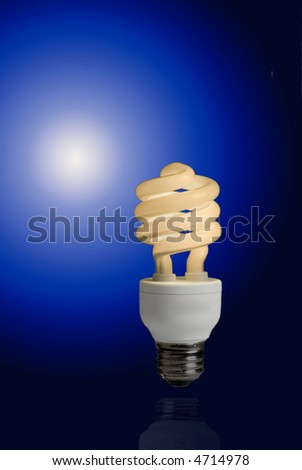 A new compact fluorescent light bulb against a deep blue gradient, these light bulbs save money and energy and are good for the environment