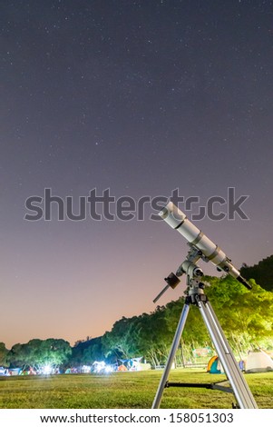 Telescope in Campsite and Starry Sky