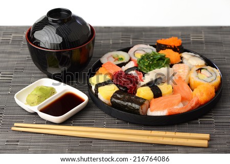 Set of Sushi Roll Japanese food with Miso soup and Chopsticks