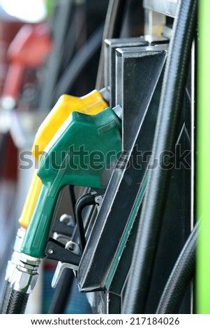 Petrol gas station pump and pumping gasoline fuel
