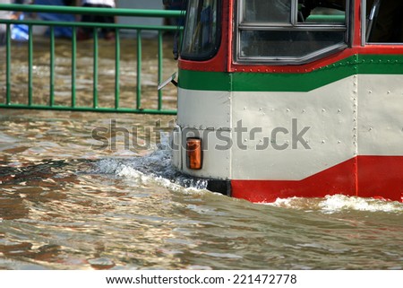 Driving Car in Flood Water at Bangkok Province, Thailand