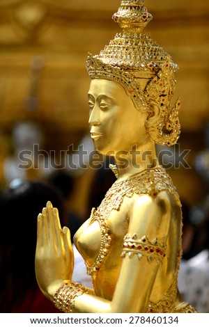 Picture from Wat Phra Kaew famous place and landmark of Thailand, Thai Woman sculpture in Sawasdee action at Grand Palace Bangkok province (Sawasdee mean say hi)
