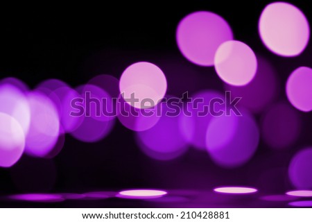 Defocused city night bokeh abstract background.Light filtered  purple.