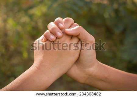 Partner hand on vintage background, Teamwork