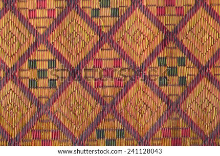 Colorful Thai fabric pattern as background.
