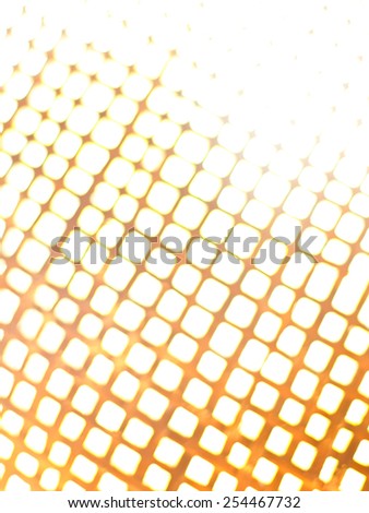 Blurred bamboo net filtered to yellow tone. Defocused photo.