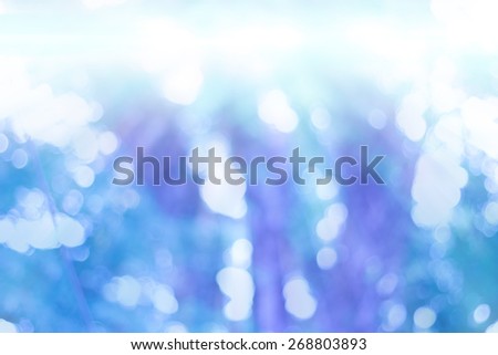 Filterrd to blue color Natural blurred background. Defocused natural abstract background.